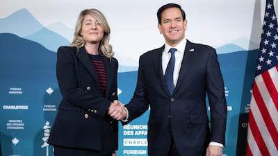 Canadian Foreign Minister Melanie Joly shakes hands with US Secretary of State Marco Rubio as G7 foreign ministers gathered in Quebec on Thursday. AP