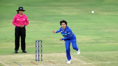 UAE's Heena Hotchandani bowls during the match.