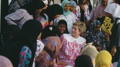 Diana, Princess of Wales, wearing a dress by the late designer Paul Costelloe, during a visit to Sultan Qaboos University in Muscat on November 12, 1986. Getty Images