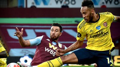 Arsenal's Pierre-Emerick Aubameyang in action against Aston Villa's Trezeguet. EPA