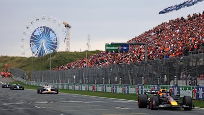 Red Bull's Max Verstappen ahead of Isack Hadjar of RB as the Dutch driver secured second place in his home GP. Getty Images