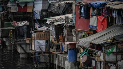 Makeshift homes are crammed together in Manila. AFP