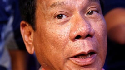With almost 90 percent of the total voted counted, Duterte leads with more than 38 per cent of the vote. Erik De Castro / Reuters
