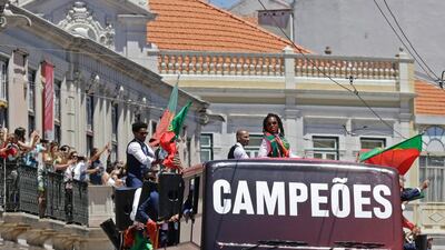 Portugal’s national football team members parade on a bus on its way to the Presidential Palace as they celebrate their victory on July 11, 2016 after their Euro 2016 final football win over France yesterday. The Portuguese football team led by Cristiano Ronaldo returned home to a heroes’ welcome today after their upset 1-0 win triumph over France in the Euro 2016 final. AFP / JOSE MANUEL RIBEIRO