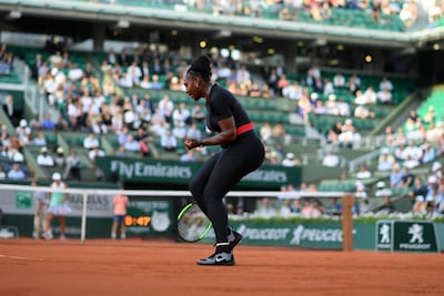Serena Williams reacts after a point against Ashleigh Barty in her second-round match. Christophe Archambault / AFP
