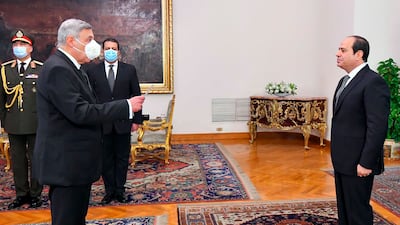 President Abdel Fattah El Sisi swears in Boulos Fahmy as the first Christian head of Egypt's Supreme Constitutional Court. AP