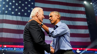 US President Joe Biden and former president Barack Obama attend a campaign event for Democratic candidates in Philadelphia. Reuters