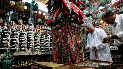 Buyer beware: shopping in places like the Mutrah souq in Muscat is fun but the goods on offer may not be all they seem. Ali Haider / EPA