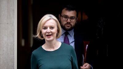 Britain's Prime Minister Liz Truss leaves 10 Downing Street to appear at Prime Minister's Questions in parliament on Wednesday. EPA