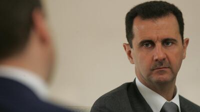 Syria's Bashar Al Assad grimaces at a visitor at the presidential palace in Damascus. Regime forces are close to retaking the rebel-held parts of Aleppo. Photo by Sasha Mordovets/Getty Images