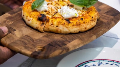 La Burrata & Tomato Pizza at French-style brasserie Le Guepard. Photo: @le_guepard_dubai / Instagram