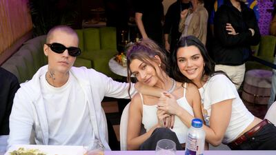 Justin Bieber with wife Hailey Bieber and friend Kendall Jenner attends Super Bowl LVI. Getty Images