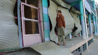 A man stands next to a damaged building in the aftermath of a truck bomb blast in Pul-e-Alam, the provincial capital of Logar province, Afghanistan. The blast on Friday killed at least 25 people. No group claimed responsibility. EPA