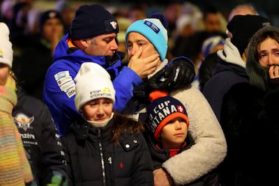 Mourners gather outside La Constellation bar in Crans-Montana, Switzerland, after the deadly fire at a New Year's Eve party. Reuters