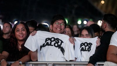 Fans show off their merchandise