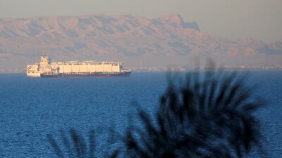 A container ship sails towards the Red Sea. Houthi attacks have disrupted shipping operations in recent months. Reuters