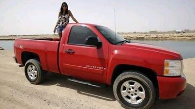 April 25, 2012 (Abu Dhabi) Meriem Cheikh-Aissa and her Chevrolet Silverado pickup. (Sammy Dallal / The National)