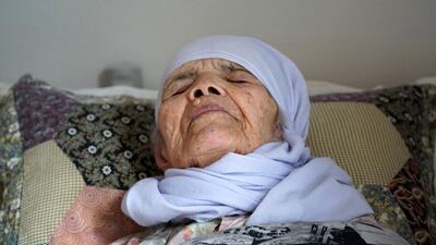 Bibihal Uzbeki, a 106-year old Afghan refugee, lies in bed in Hova, Sweden where her family has been living while waiting to be granted asylum. David Keyton / AP Photo / September 3, 2017