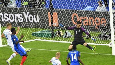 Iceland forward Kolbeinn Sigthorsson shoots to score his team’s first goal. Miguel Medina / AFP