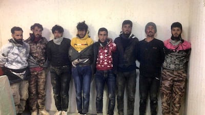 Suspected Syrian smugglers who the Jordanian military says it arrested after a border shoot-out on Monday. Petra News Agency