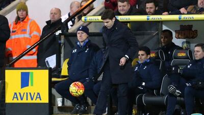 Tottenham Hotspur manager Mauricio Pochettino kicks at the ball during his team’s Premier League match against Norwich City on Tuesday. Matthew Childs / Action Images / Reuters