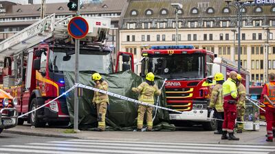 Rescue personnel cordon the place where several people were stabbed, at Turku Market Square. Roni Lehti / Lehtikuva via Reuters.