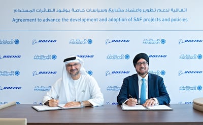 Mohammad El Ramahi, chief green hydrogen officer of Masdar, and Kuljit Ghata-Aura, Boeing's president for the Middle East, Turkey and Africa, signed a preliminary agreement for the advancement of the sustainable aviation fuel sector. Photo: Masdar