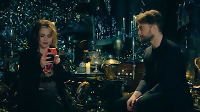 Helena Bonham Carter (Bellatrix Lestrange) and Daniel Radcliffe.