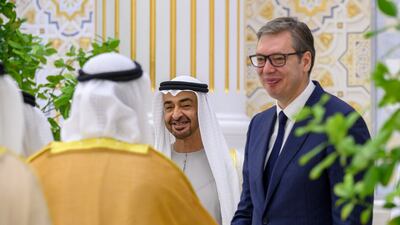 Mr Vucic greets a dignitary.