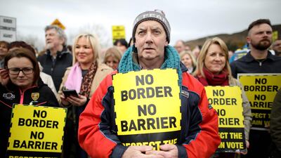 Protesters at the Carrickcarnan border between Newry in Northern Ireland and Dundalk in the Irish Republic. AFP/Paul Faith