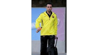 Xavi, the Barca midfielder, arrives in London.