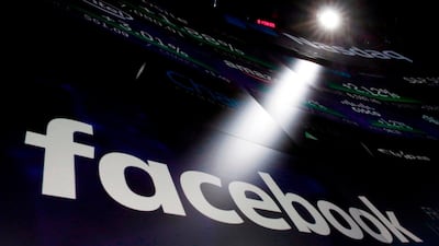 Facebook shares climbed on Wednesday after the company said revenues and profit beat estimates on the back of near-record ad sales. Richard Drew / AP Photo