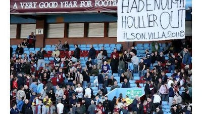 Aston Villa fans display a banner criticising Gerard Houllier at the weekend. Paul Childs / Action Images