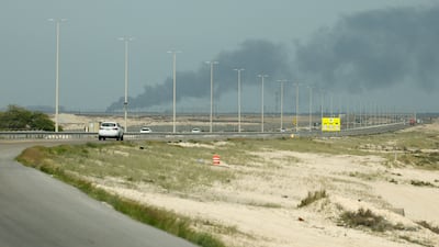 Smoke billows from Saudi Aramco's Ras Tanura oil refinery after a reported Iranian drone strike. Reuters