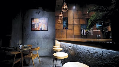 The chef bar inside allows customers to interact with those cooking their food right in front of them. Courtesy 3 Fils.