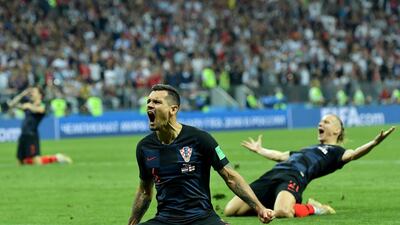 Croatia defender Dejan Lovren celebrates with teammates after a 2-1 extra-time win over England in the World Cup semi-finals. EPA