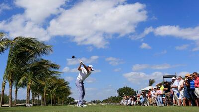 Rory McIlroy ended Friday's round tied for fifth at the WGC-Cadillac Championship, a stroke behind the four-way tie for first. Jamie Squire / Getty Images / AFP / March 7, 2014
