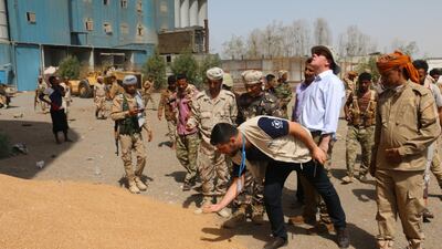 A team of UN and World Food Programme workers visit mills in Hodeidah, Yemen, in February after an attack by Houthis. EPA
