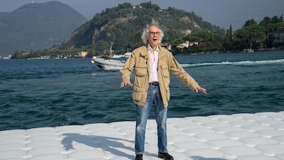 During testing at Lake Iseo, Montecolino, Italy. Christo is delighted that the pier segment undulates with the movement of the waves. Photo: Wolfgang Volz October 2015