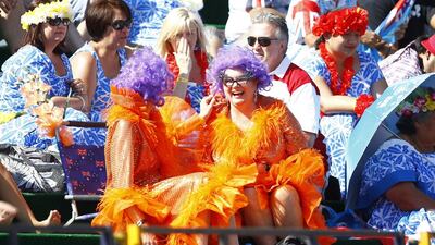 Fans dressed as Dame Edna Everage during the Sevens World Series match between Fiji and USA at The Sevens in Dubai on Friday. Jake Badger for The National
