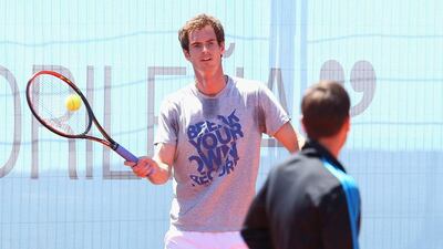 Andy Murray rallies at a practice session ahead of the Madrid Masters at the Caja Magica on Saturday. Julian Finney / Getty Images / May 3, 2014