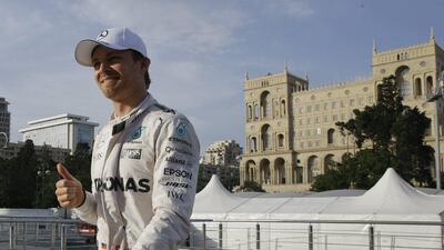 Nico Rosberg gives a thumbs up after clinching pole for the European Grand Prix in Baku. Luca Bruno / AP Photo