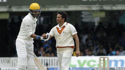 Sachin Tendulkar, right, and Yuvraj Singh, left, share a moment during the Lord's Bicentenary match on Saturday. Ian Kington / AFP / July 5, 2014