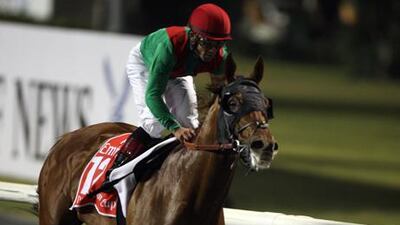 Joel Rosario rides Animal Kingdom to victory at the 2013 Dubai World Cup.