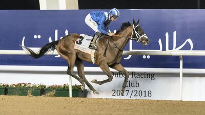 Etijaah under jockey Dan O’Neill gallops to a big win at Meydan Racecourse on Thursday night. Antonie Robertson / The National