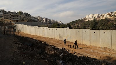 The Israeli barrier in the East Jerusalem refugee camp of Shuafat. Reuters