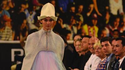 Nazerke Dauskozhayeva’s charming mix of an oversize cloche hat, constricting bolero cape and layers of billowing net is bold, brave and interesting. Courtesy ESMOD