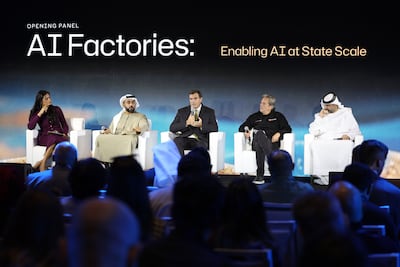From left, Lenah Hassaballah, an editor at CNN Business Arabic, moderates a panel with Faris Al Mazrui, head of technology investments at Mubadala, Andrew Jackson, group chief AI officer of G42, Richard Morton, a managing director at Mohamed bin Zayed University of Artificial Intelligence, and Abdelrahman Al Mahmoud, director for AI at the Digital Economy and Remote Work Applications Office in the Prime Minister's Office, at the Machines Can Think summit in Abu Dhabi on January 26. Chris Whiteoak / The National