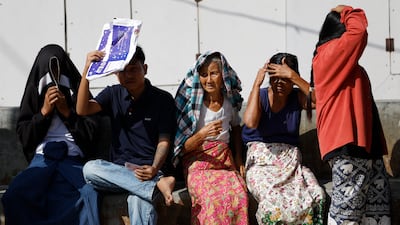 Voters wait to cast ballots at a polling station in Naypyitaw, Myanmar, during the first phase of the general election. EPA