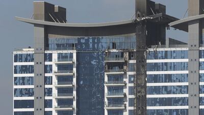 The burned elevation of one of the towers at the Oceana complex in Dubai. Kamran Jebreili / AP Photo